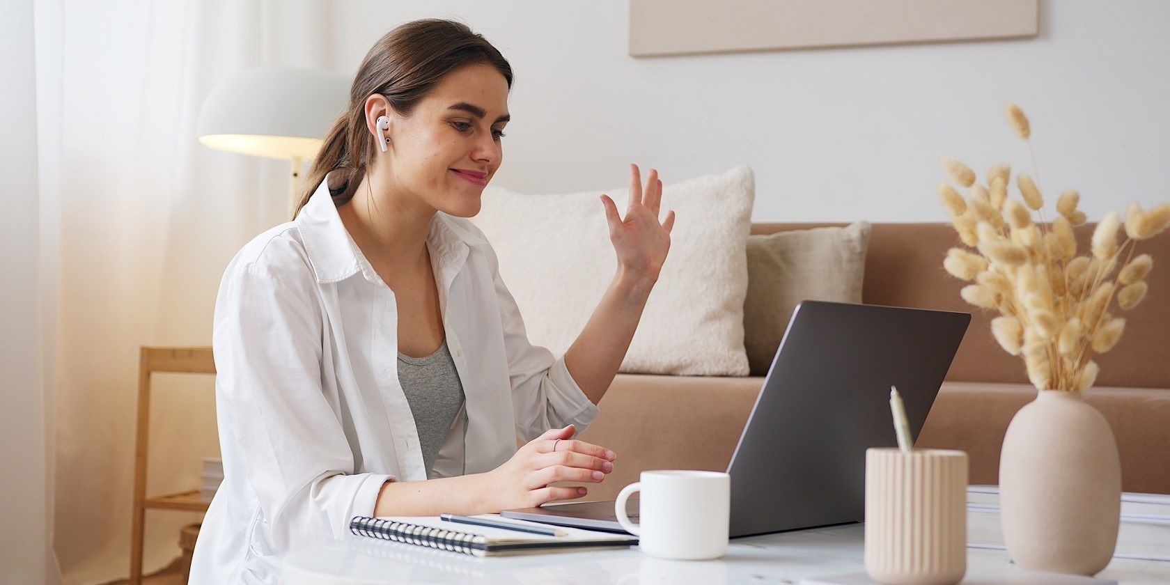 smilling woman having a video call